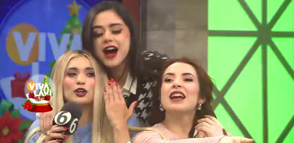 Conductoras de Vivalavi organizan beso de tres