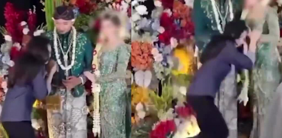 Mujer besa la mano de novio y esposa la desgreña