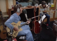 Publican video inédito de John Lennon y George Harrison