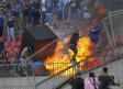 Aficionados de la U de Chile incendian las tribunas durante la Copa Libertadores