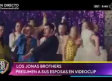 Los Jonas Brothers presumen a sus esposas en videoclip