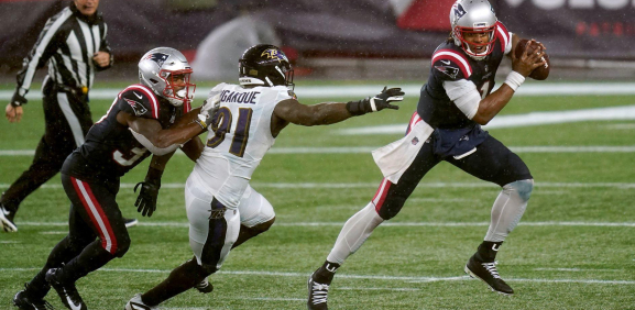 Cam Newton y los Patriots sorprenden en la lluvia a Baltimore